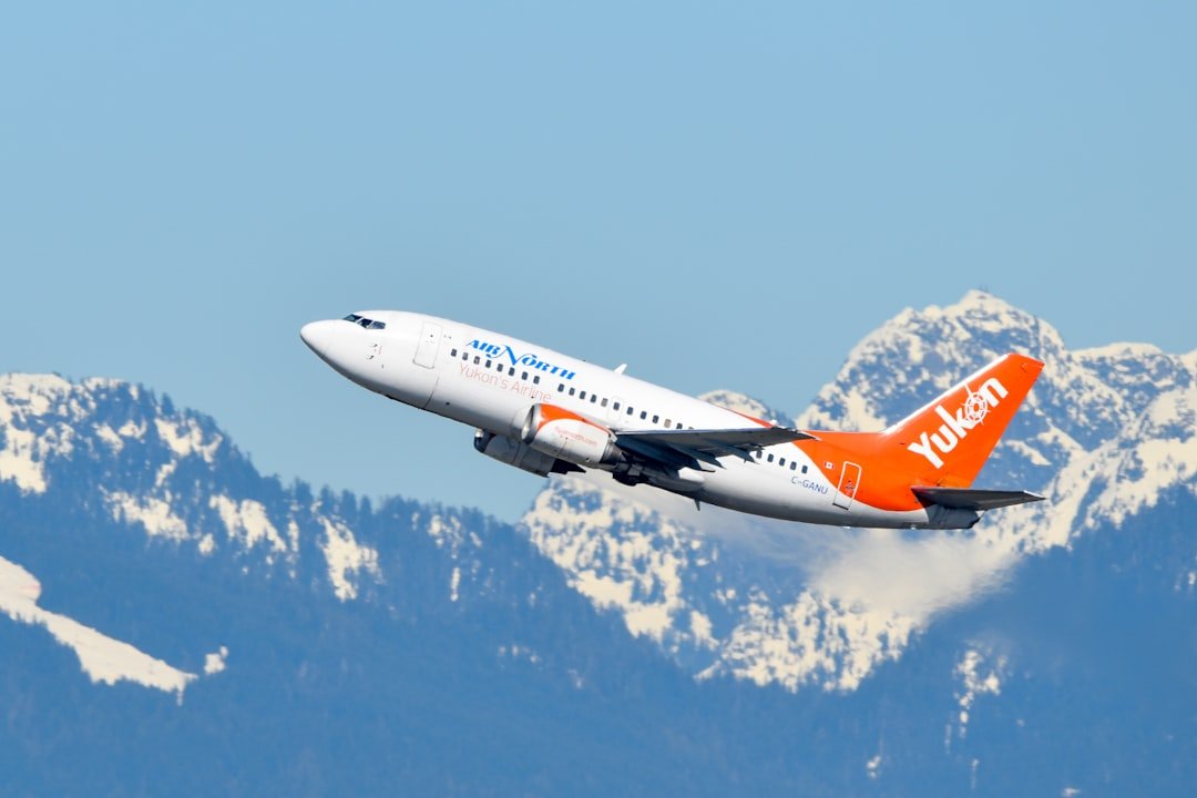 Airlines Fuel Shortage Cancellations: Aircraft on tarmac with fuel trucks and airport operations in the background, symbolizing supply chain management.